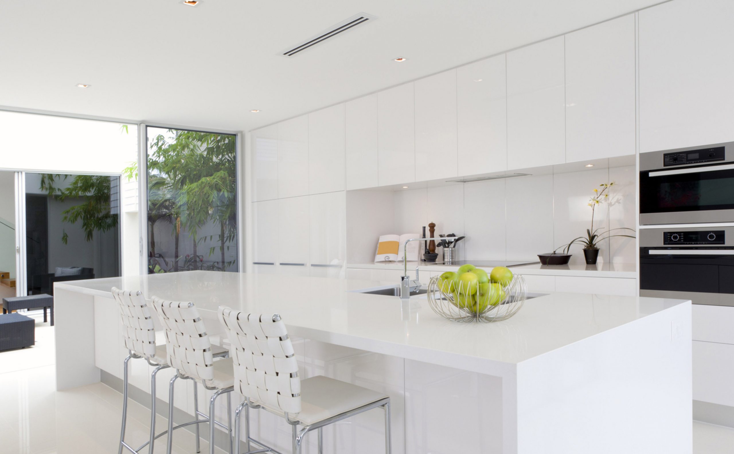 Rinnai Inverter Split Ducted Air Conditioner (lifestyle - kitchen white)