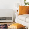 Rinnai Energysaver Heaters 559FDT (Commercial) Lifestyle Family Room heater next to couch