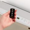 Rinnai Avenger 25 Convector Portable Gas Heater AV25BLZ21 Closeup and IR Remote Controler