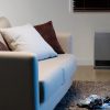 Rinnai Enduro 13 Convector Portable Gas Heaters Platinum Silver Angle Right Insitu Lifestyle family room couch