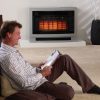 Rinnai Ultima II Console Gas Flued Heater Silver Angle Right 2 Lifestyle Insitu Family Room Business man reading